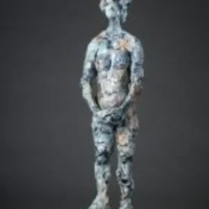 Sculpture of a woman adorned with a flower on her head, showcasing elegance and grace in a serene pose.