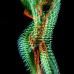 A glowing green and red woman with her arms raised, exuding an energetic and vibrant presence.