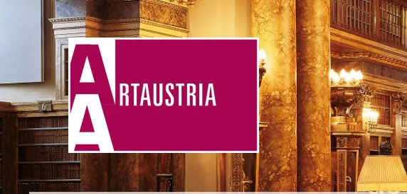 Logo of "Art Austria" over a richly decorated library interior with ornate furnishings and warm lighting.